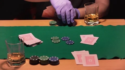 Poker game with gloves for the new normal and for the covid-19 Stock Footage 132884374