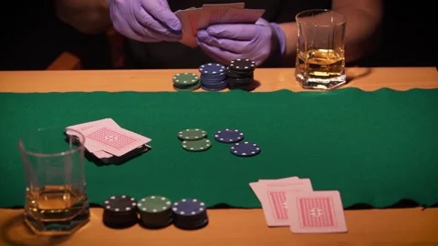 Poker game with gloves for the new normal and for the covid-19 Stock Footage 132884376