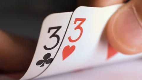 Poker hand pair of threes Video stock 116094873