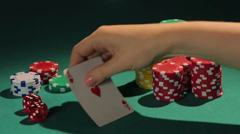 Poker match winner intriguing rival by showing one card at a time, lucky player Video stock 61835250