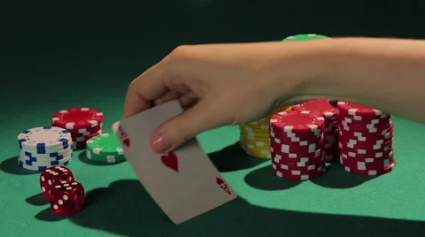Poker match winner intriguing rival by showing one card at a time, lucky player Video stock 61894156