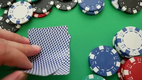 Poker Player Makes a Bet On The Table With Poker Chips Stock Footage