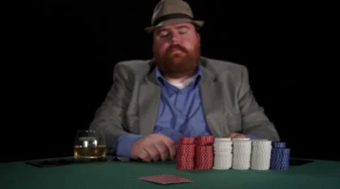 Poker player places bet with a stack of chips Stock Footage 53242665