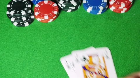 Poker player with pocket pair of jacks shows his cards. Stock Footage 58744463
