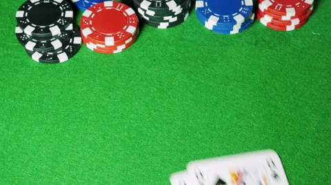 Poker player with pocket pair of queens shows his cards. Stock Footage 58744377