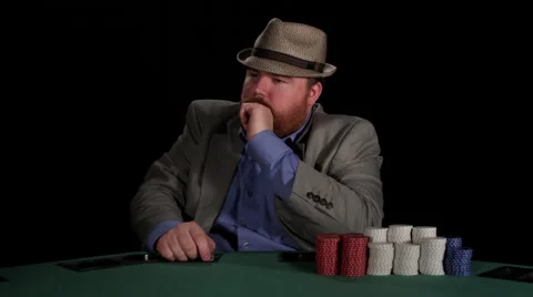 Poker player points at camera and gives a thumbs up Stock Footage 53235446