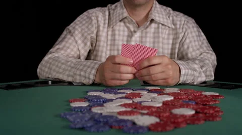 Poker player throws down an ace and jack, then drags the pot towards him Stock Footage 53235476