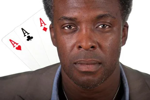 Poker player with winning  cards in hand Stock Photos