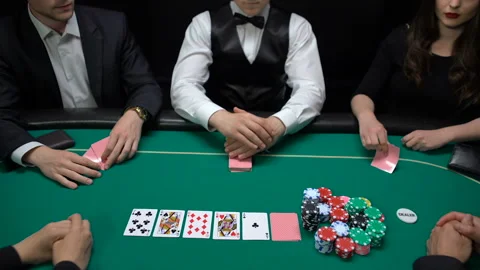 poker-players-putting-dollars-and-footage-093411395_iconl.jpeg