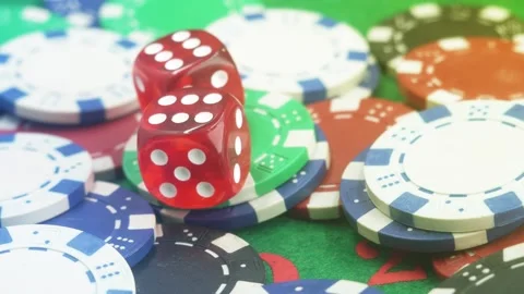 Poker Table With Poker Chips Turns In Casino. Many Poker Chips Spins on the Stock Footage 284229087