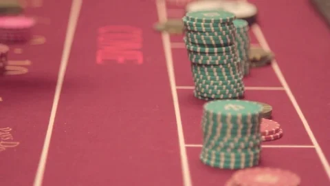 Poker table. The return of the chips won. casino Stock Footage 77910460