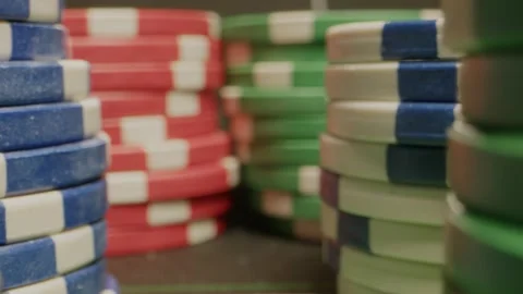 Pokers chips and dice cube on green table close-up macro. Poker gamble game and Stock Footage 261061696
