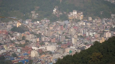 Pokhara, Nepal. High angle pan of city towards the mountains. 스톡 동영상 140664332