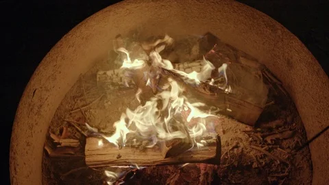 Poking stick in the Campfire Stock Footage 116441301