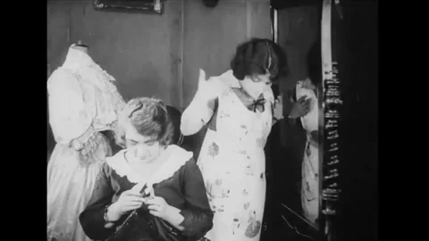 POLAND - 1923 - in this silent comedy, a servant takes a girl upstairs and Stock Footage 341992654