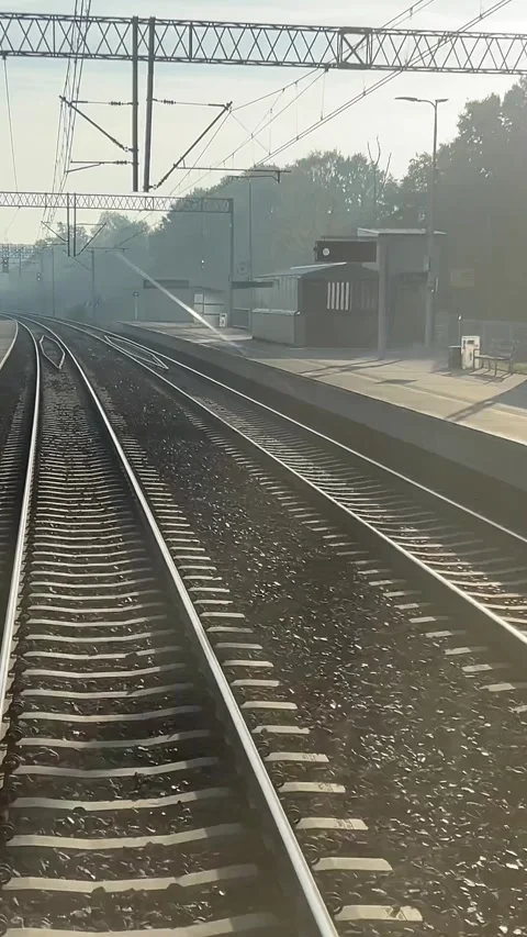 Poland, Krakow, Train pulling into train station next to loading platform with Video stock 290969407