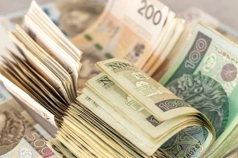 Poland money. A large stack of 100 and 200 zloty bills. Polish finances. Stock Photos