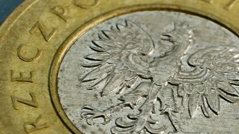 Poland's state symbol on copper coin. Smooth rotation. Super macro video shot Stock Footage 89566397
