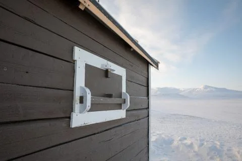 Polar bear window shutter on a small cabin in Svalbard, Norway Stock Photos