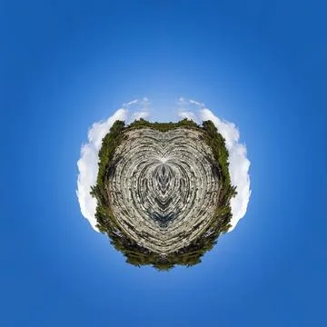 Polar coordinates, a circular image of a blue sky, picturesque rocks 스톡 사진