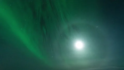 Polar lights in bright moonlight Stock Footage 198714501