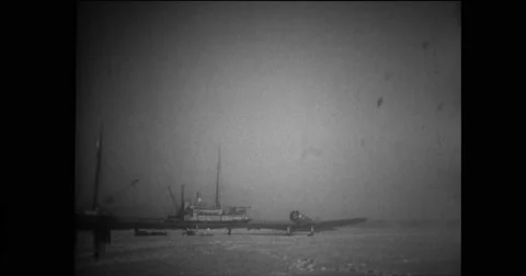 Polar Star aircraft taxiing on ice to the side of ship Stock Footage