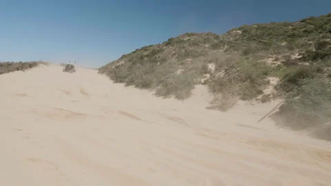 Polaris Driving Fast through corner on Sand 4k 스톡 동영상 235639664
