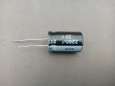 Polarized capacitor on a dark background or  filter Stock Photos