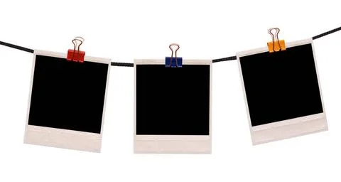 Polaroid frame on a rope polaroid frames on a rope ,model released, Symbol... Stock Photos