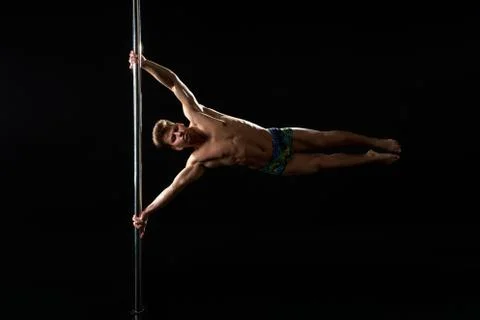 Pole dance. Image of dancer with strained face Stock Photos
