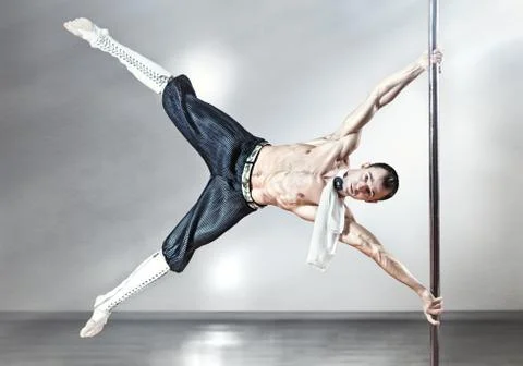 Pole dance man Stock Photos