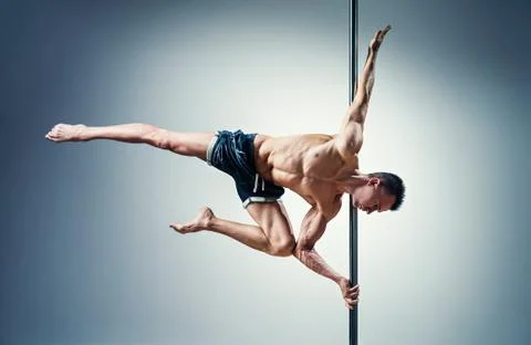 Pole dance man Stock Photos