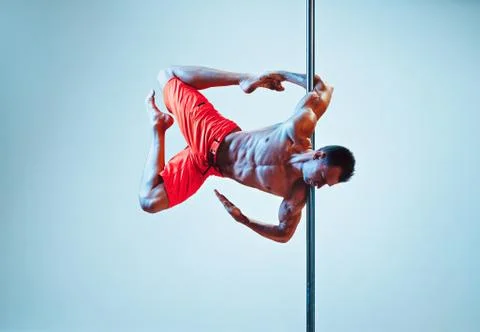 Pole dance man 스톡 사진