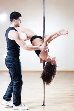 Pole dance trainer 스톡 사진