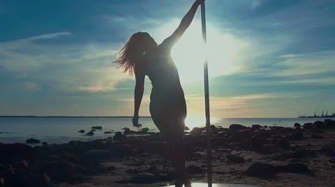 Pole dancer outdoor Stock Footage 64914326
