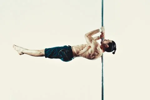 Pole dancing man Stock Photos