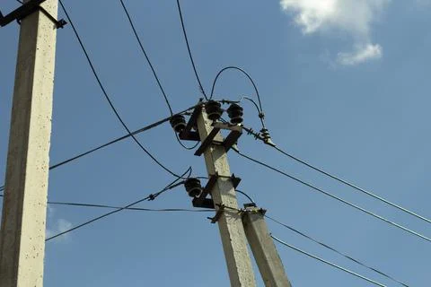 Pole with electricity. Lots of high-current wires. Stock Photos