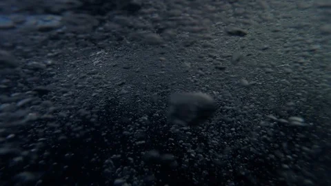 Pole mount camera submerged in ocean from side of motorboat Stock Footage 120368321