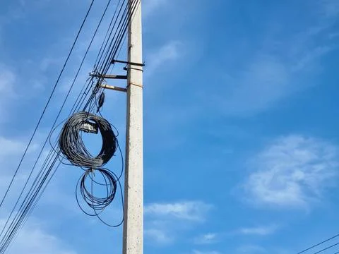 A pole with tangled wires Stock Photos