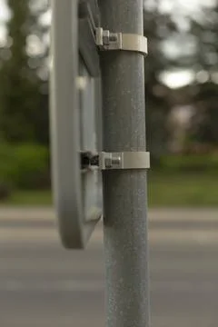 Polemounted brackets with symmetrical layered design and shallow depth Stock Photos