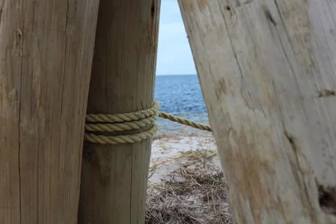 Poles on the beach Stock Photos