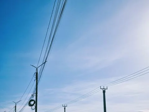 Poles with electric wires Stock Photos