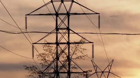 Poles of power lines close up. Evening sunset. Stock Footage 119334433
