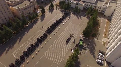 Police Academy. Recruits Standing on the parade ground. Aerial view Stock Footage 59323072