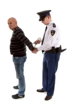 Police agent is making a arrest Stock-Fotos