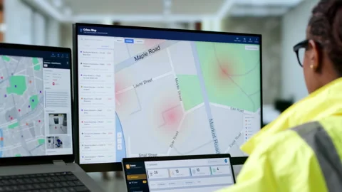 Police Analyst Studies Crime Data Patterns Using GIS Software Stock Footage 346323350