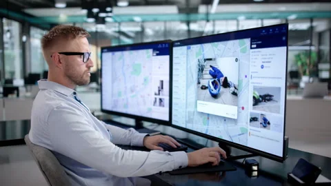 Police Analyst Studies Crime Data On Computer Stock Footage 347282765