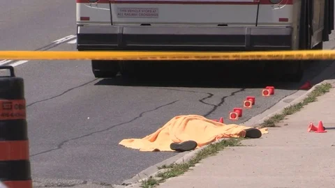 Police and ambulance paramedics at fatal pedestrian hit by transit bus accident. Stock Footage