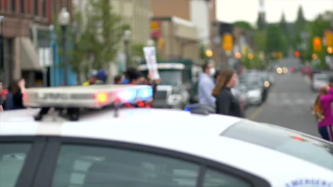 Police and protesters march Stock Footage 132082597