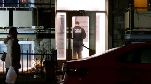 Police in apartment building Stock Footage 125361675